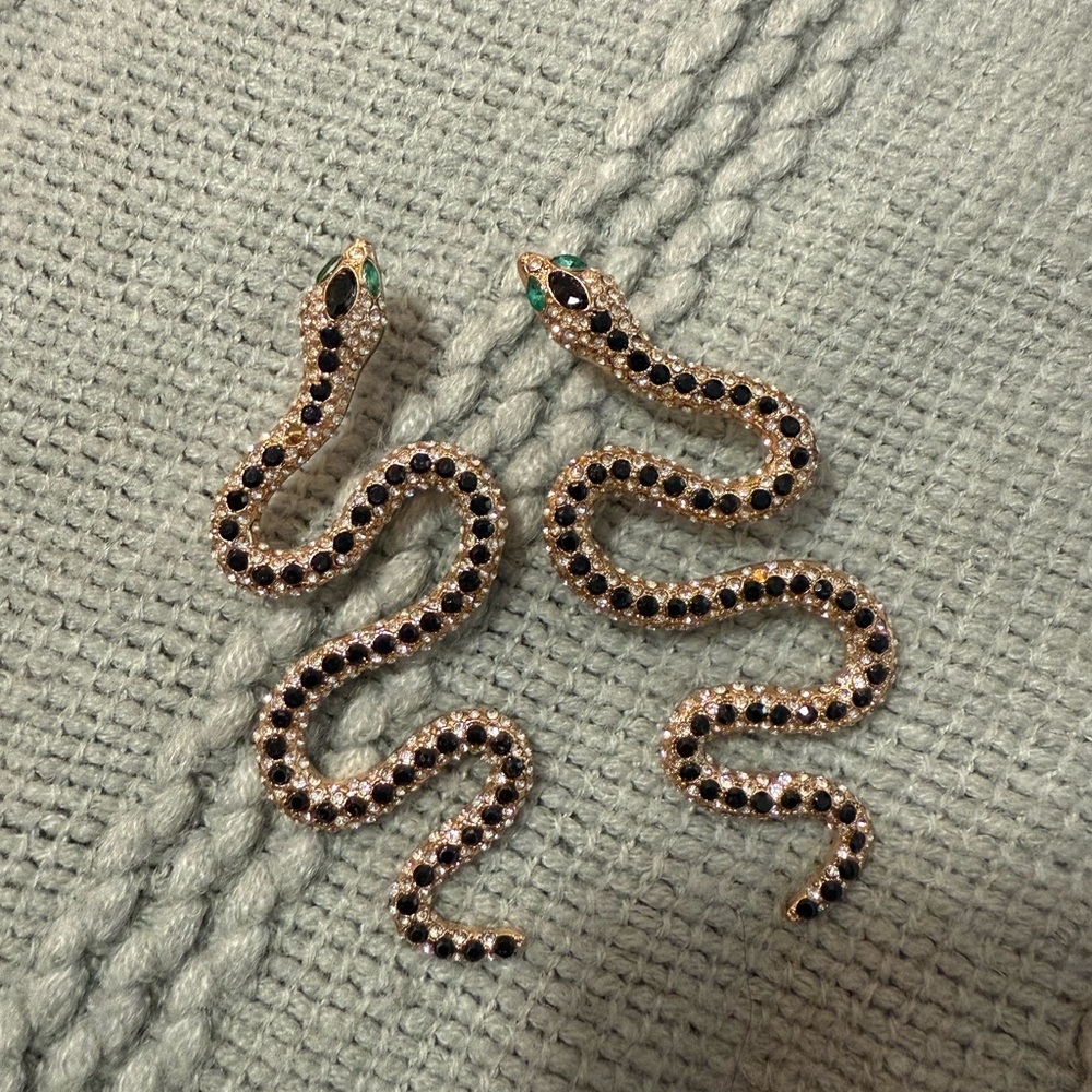 Aldo Gold and Black Curved Earrings